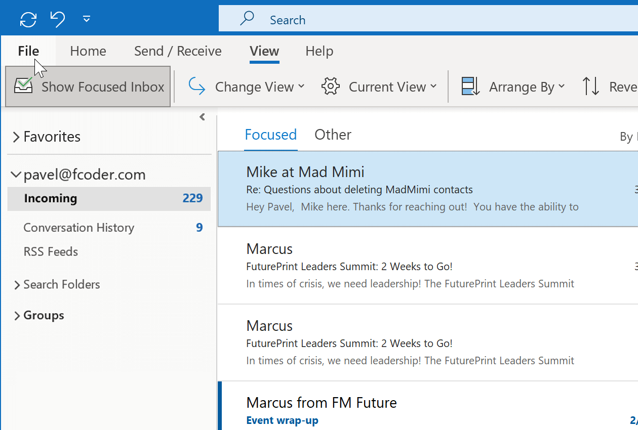 Open Outlook and click the File tab